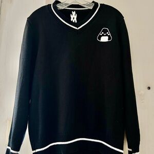 Chic Black V-Neck Sweater with White Accents